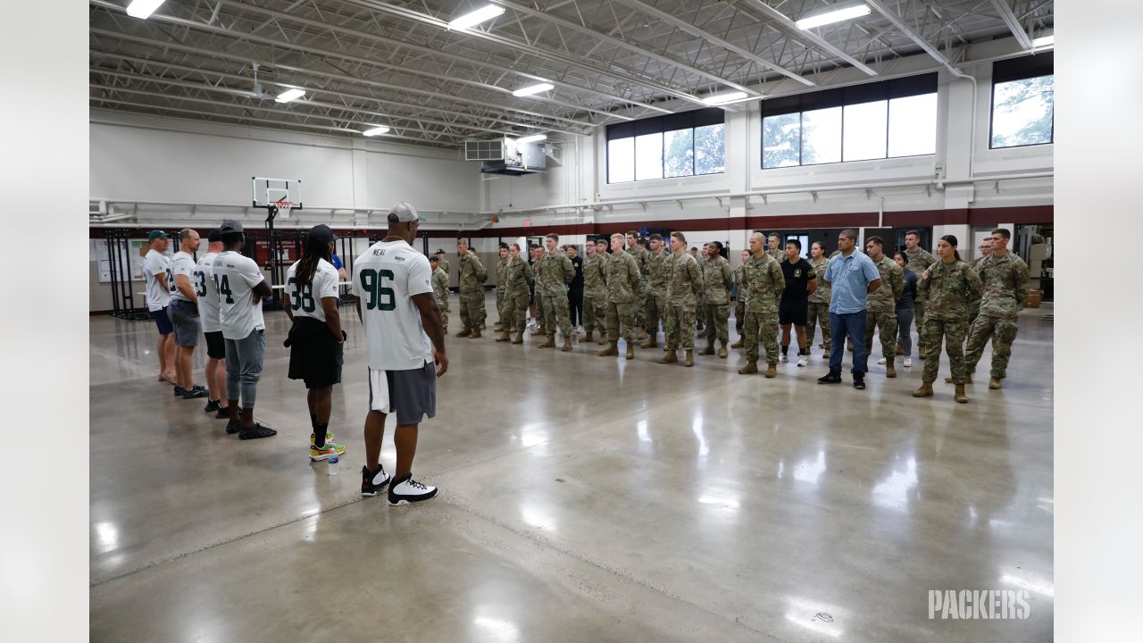 Cincinnati football teams wear Army National Guard camouflage uniforms