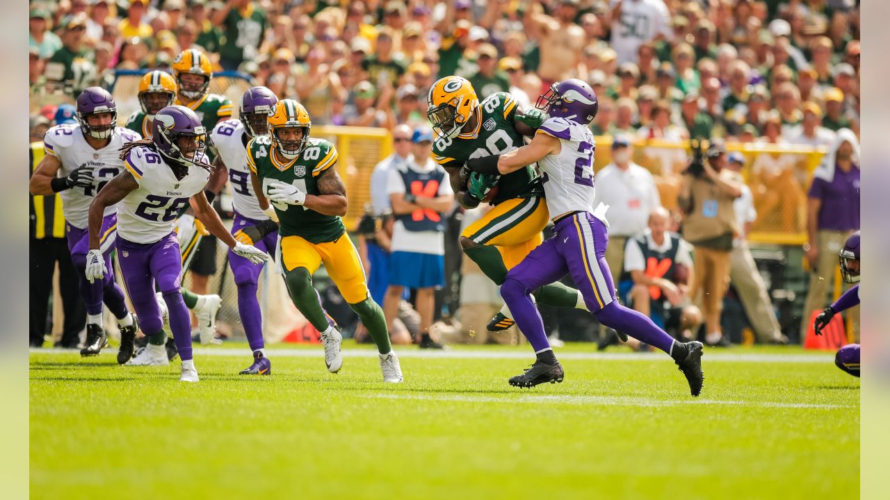 Wild game, weird ending as Packers, Vikings tie