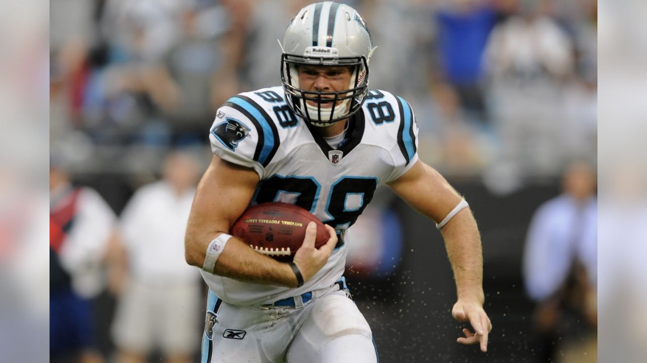 FILE- In this Sunday, Nov. 26, 2017, file photo, Carolina Panthers tight  end Greg Olsen (88) warms up prior to an NFL football game against the New  York Jets in East Rutherford