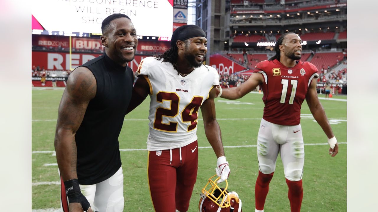 File:Arizona Cardinals wide receiver Larry Fitzgerald, left, and defensive  safety Adrian Wilson share a laugh