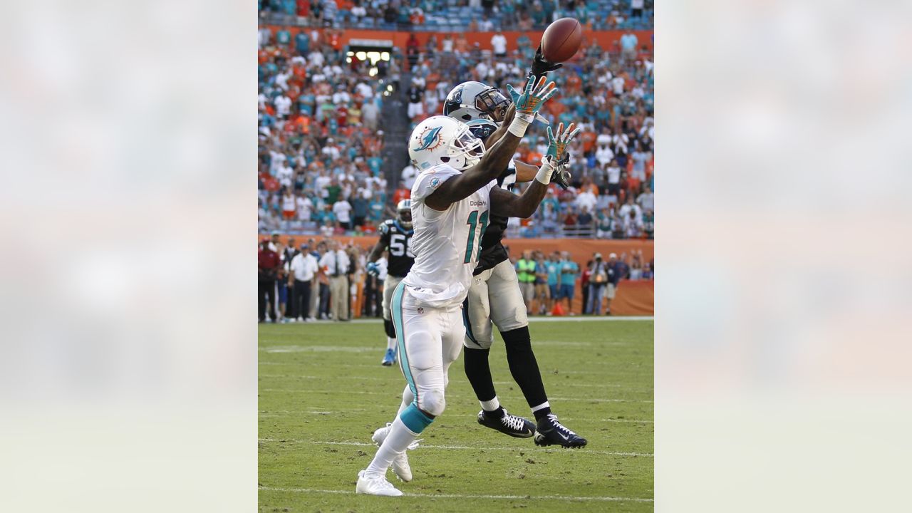 Miami Dolphins defensive end Jared Odrick (98) walks onto the