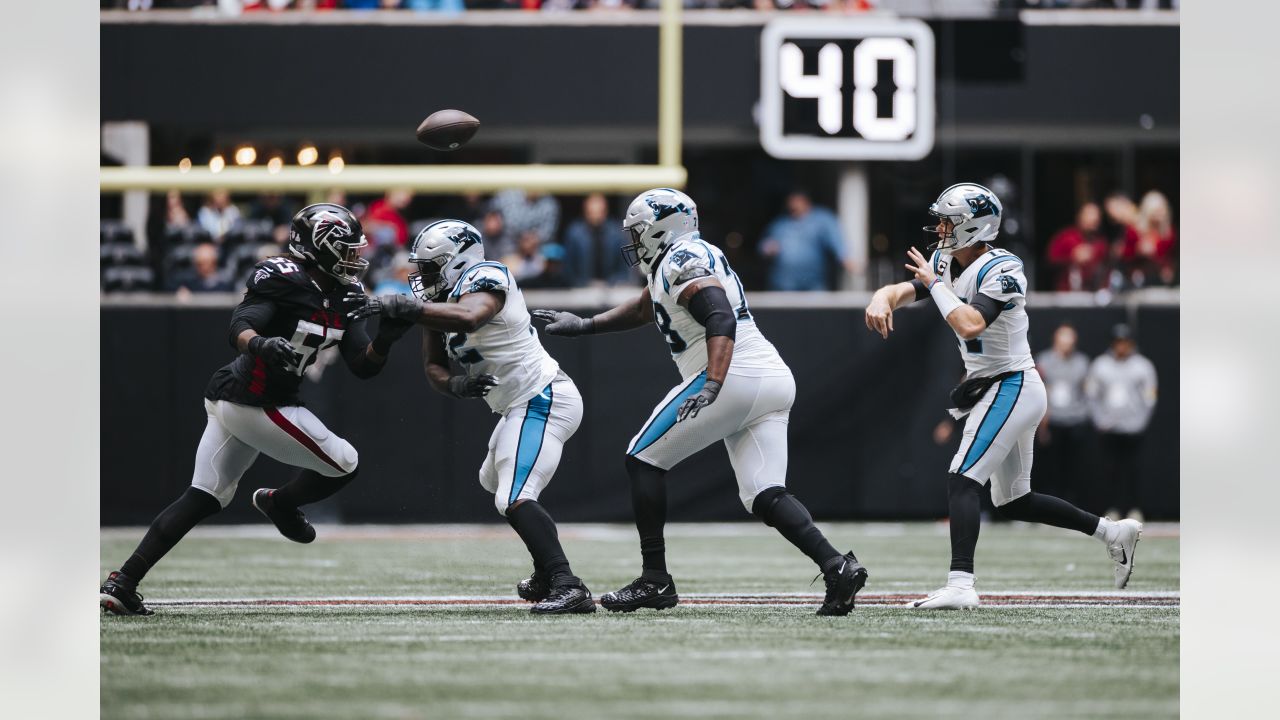 Carolina Panthers cornerback Stephon Gilmore (9) intercepts a pass intended  for Atlanta Falcons tight end Kyle Pitts (8) during the second half of an  NFL football game, Sunday, Oct. 31, 2021, in