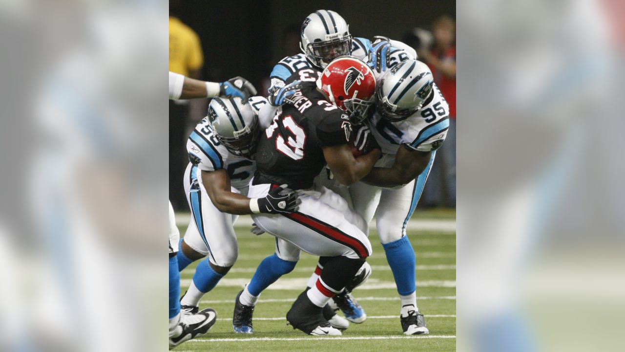 Carolina Panthers defensive end Charles Johnson (95) freacts to a play  against the Chicago Bears in the first half of an NFL football game in  Chicago, Sunday, Oct. 2, 2011. The Bears