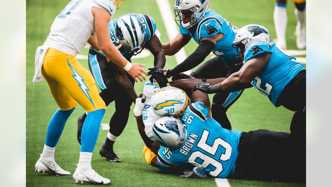 Carolina Panthers defensive tackle Derrick Brown (95) encourages the crowd  to get loud during an NFL football game against the Atlanta Falcons,  Thursday, Nov. 10 2022, in Charlotte, N.C. (AP Photo/Brian Westerholt