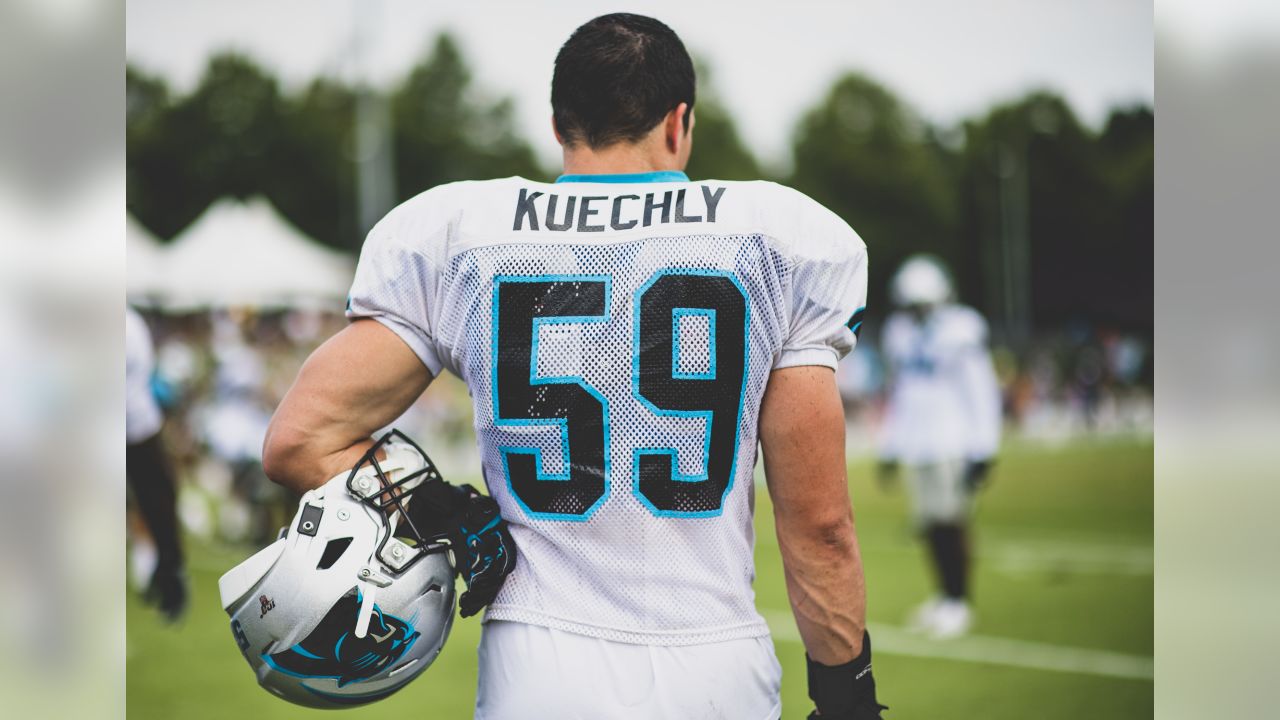 PHOTO: Falcons QB Matt Ryan shows off his Luke Kuechly Panthers jersey 