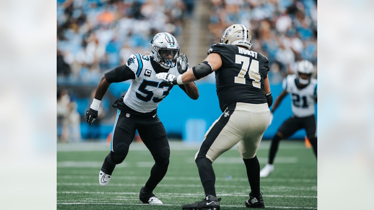 Carolina Panthers defensive end Brian Burnes runs a drill during