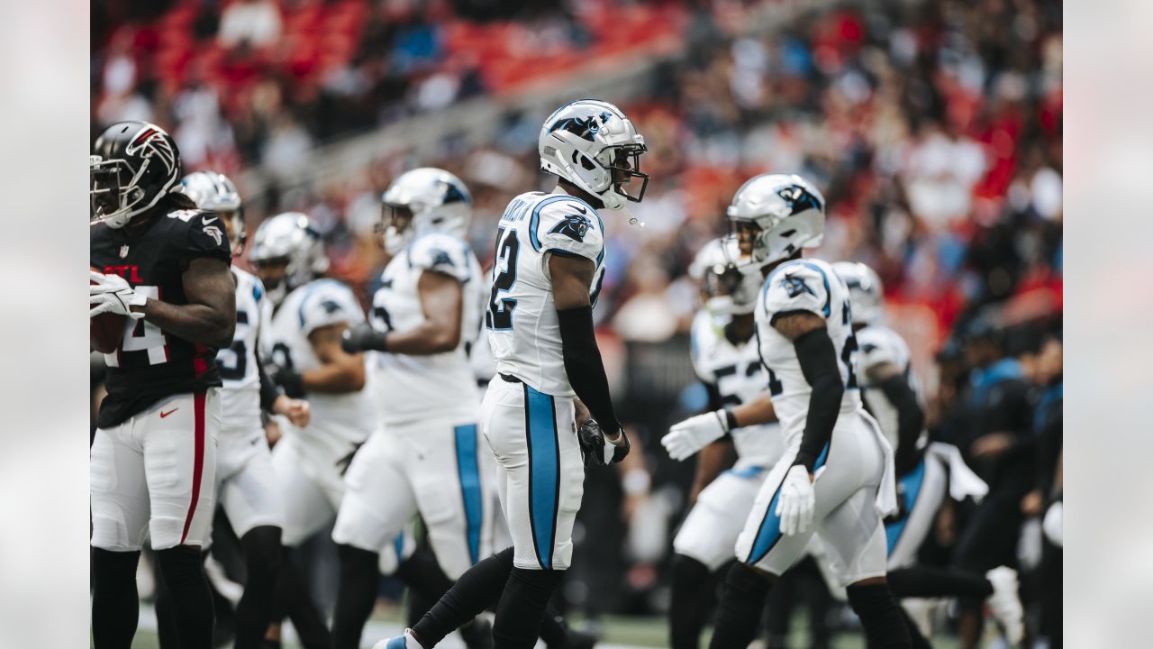 Carolina Panthers cornerback Stephon Gilmore (9) intercepts a pass intended  for Atlanta Falcons tight end Kyle Pitts (8) during the second half of an  NFL football game, Sunday, Oct. 31, 2021, in