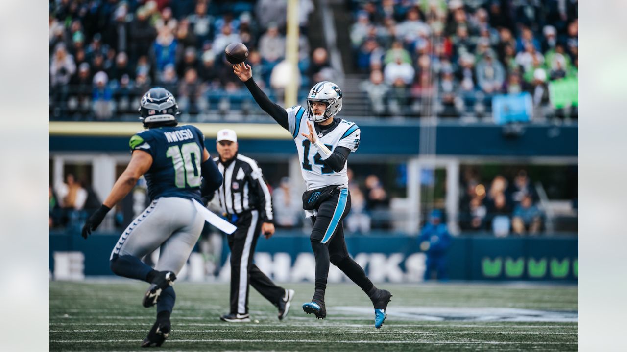 Carolina Panthers defensive tackle Daviyon Nixon (54) sings while sitting  on the bench during an NFL football game against the Denver Broncos,  Sunday, Nov. 27, 2022, in Charlotte, N.C. (AP Photo/Brian Westerholt