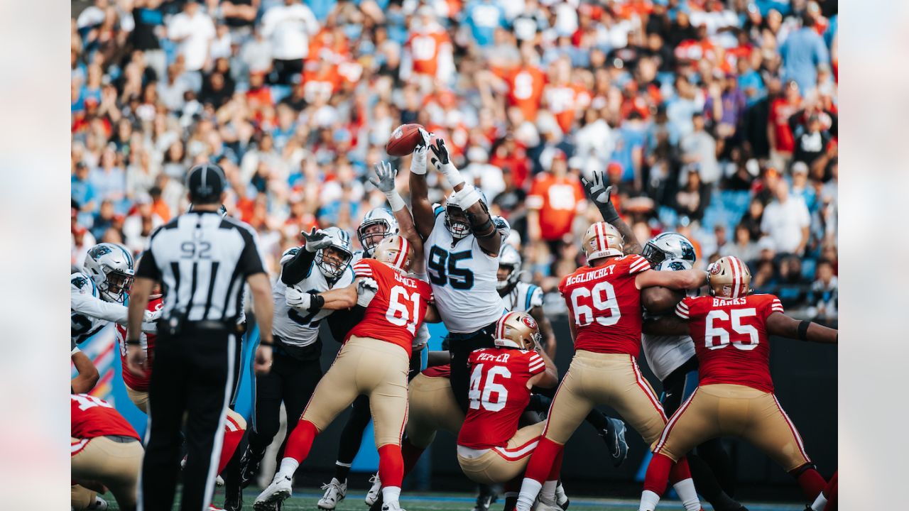 Carolina Panthers linebacker Damien Wilson watches during the first have of  an NFL preseason football game against the Buffalo Bills on Friday, Aug.  26, 2022, in Charlotte, N.C. (AP Photo/Jacob Kupferman Stock