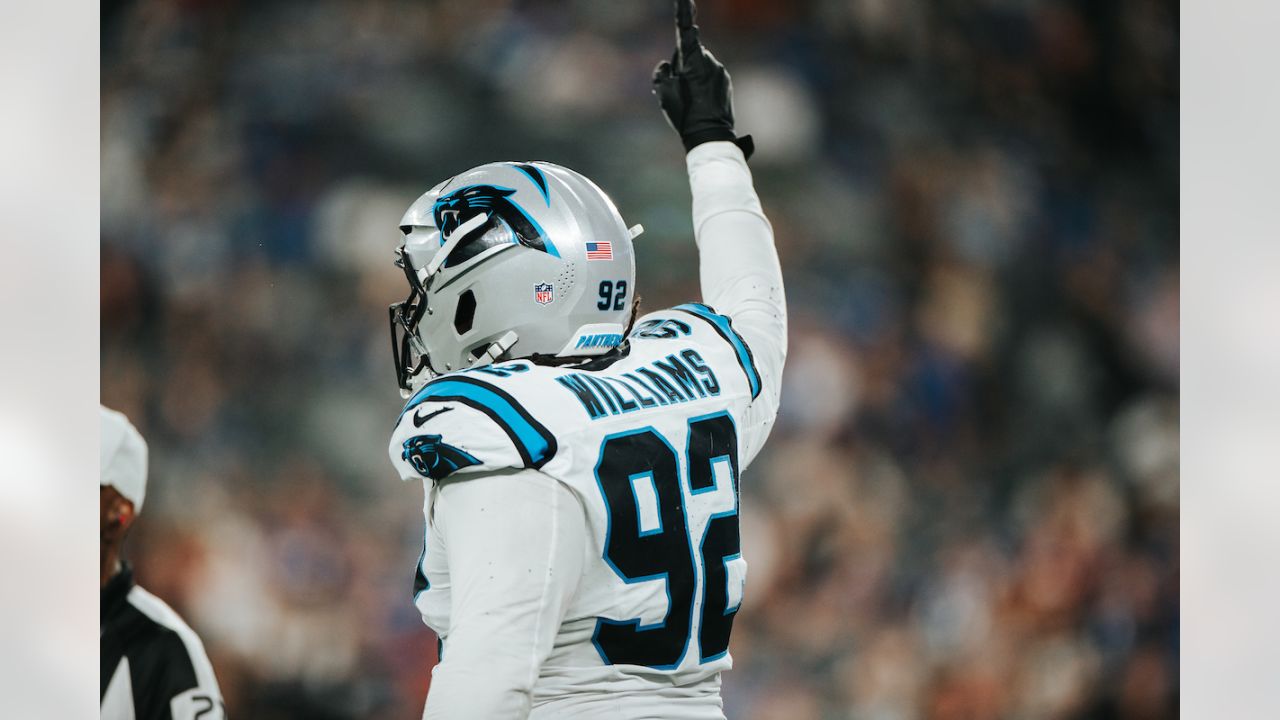 Carolina Panthers defensive tackle Derrick Brown (95) wears a Crucial Catch  t-shirt as he warms up prior to an NFL football game against the  Philadelphia Eagles, Sunday, Oct. 10, 2021, in Charlotte