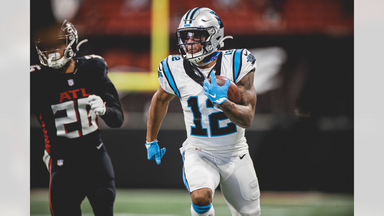 Atlanta Falcons vs. Carolina Panthers. NFL Game. American Football League  match. Silhouette of professional player celebrate touch down. Screen in  bac Stock Photo - Alamy