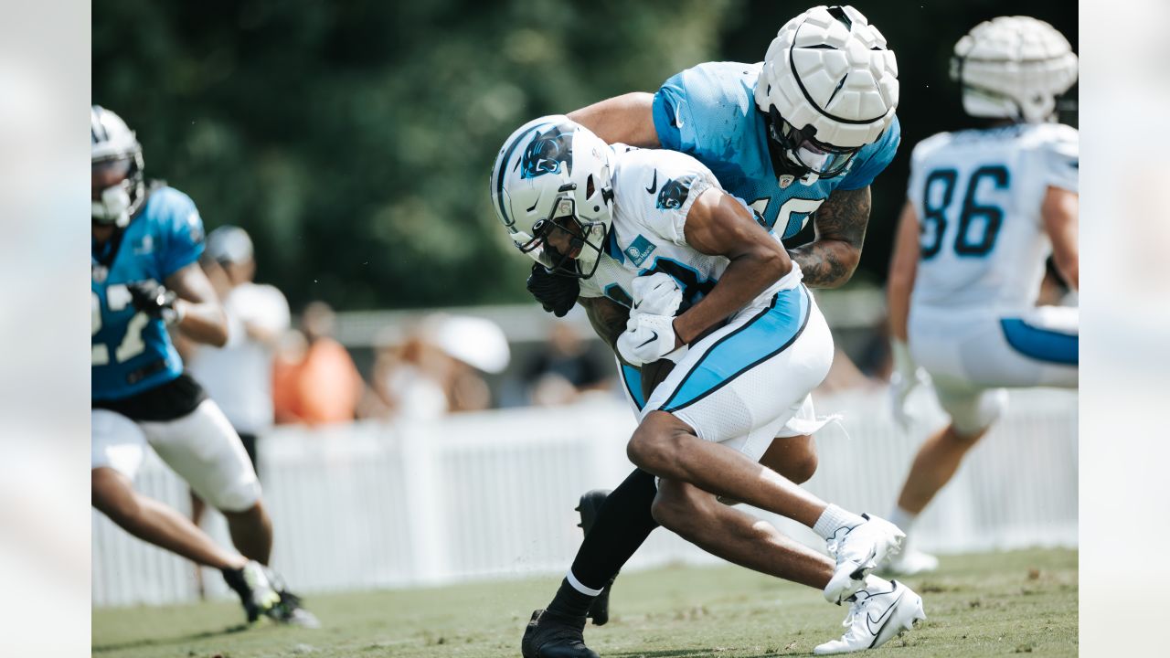 Carolina Panthers offensive tackle Ikem Ekwonu walks onto the field at the  NFL football team's training camp on Saturday, July 29, 2023, in  Spartanburg, S.C. (AP Photo/Jacob Kupferman Stock Photo - Alamy