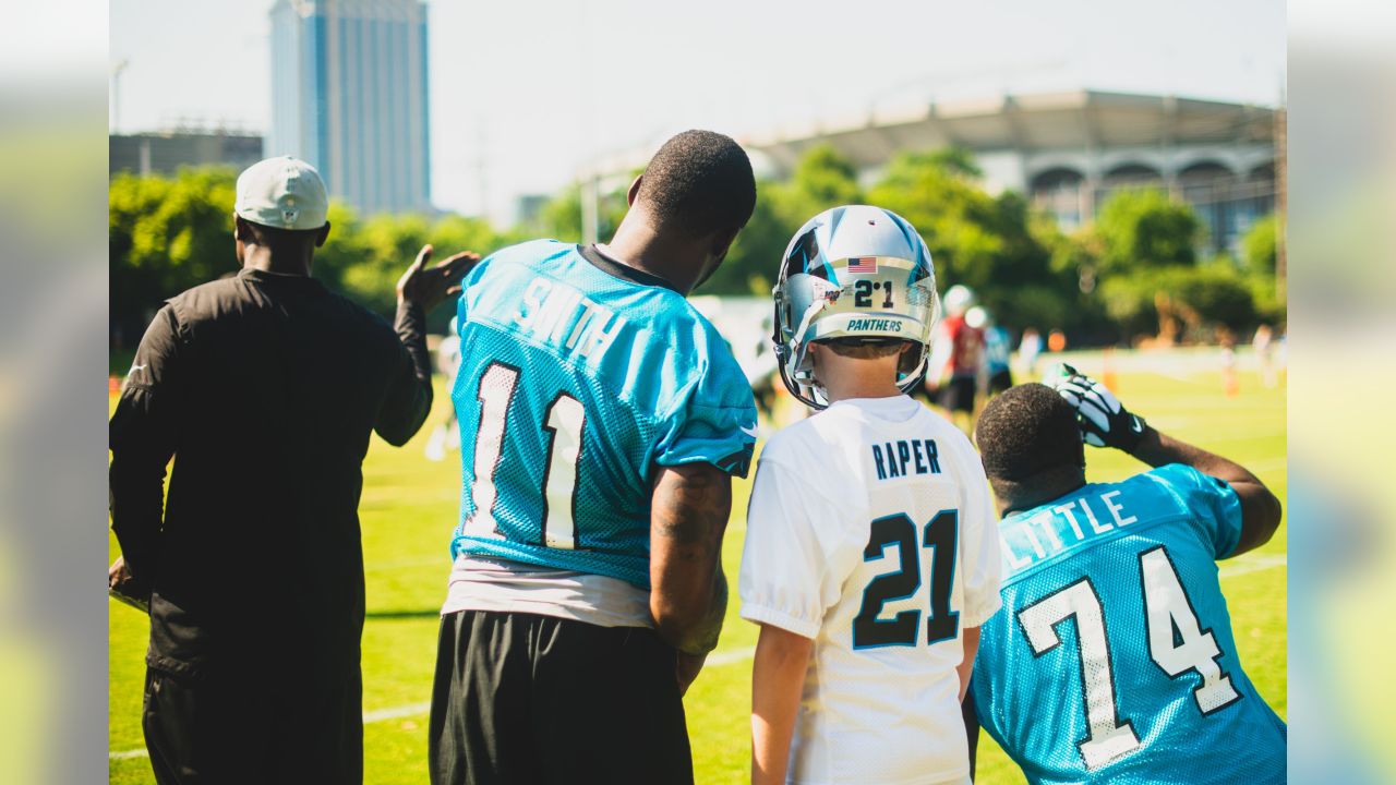 Young Panthers fan flips out over getting Christian McCaffrey jersey