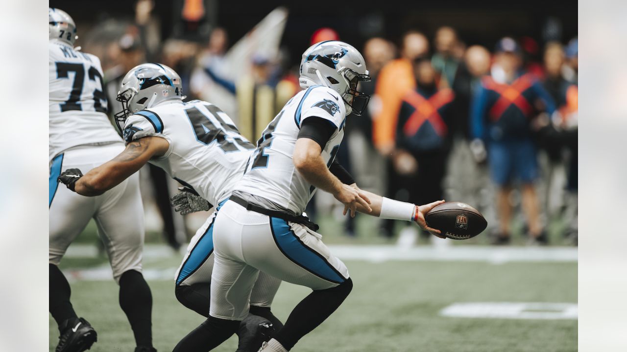 Carolina Panthers cornerback Stephon Gilmore (9) intercepts a pass intended  for Atlanta Falcons tight end Kyle Pitts (8) during the second half of an  NFL football game, Sunday, Oct. 31, 2021, in