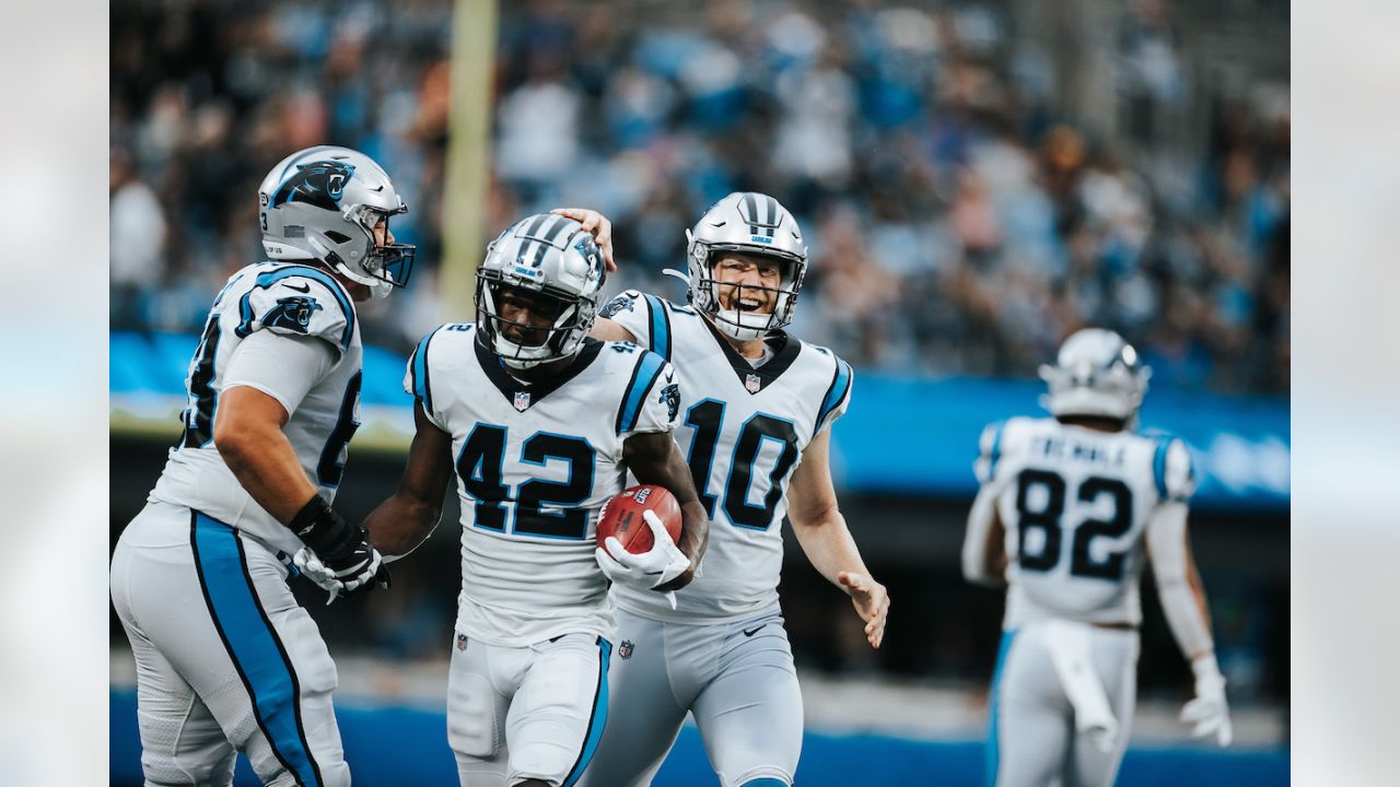 Carolina Panthers linebacker Damien Wilson watches during the first have of  an NFL preseason football game against the Buffalo Bills on Friday, Aug.  26, 2022, in Charlotte, N.C. (AP Photo/Jacob Kupferman Stock