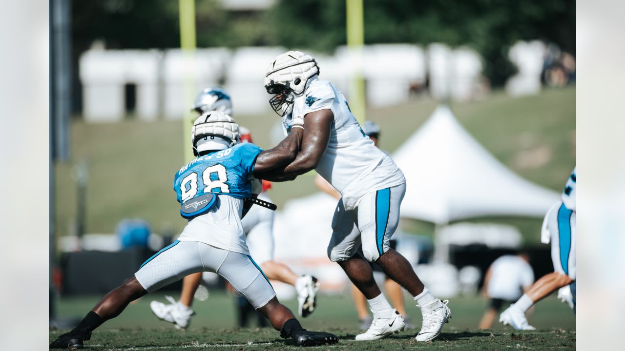 Carolina Panthers offensive tackle Ikem Ekwonu walks onto the field at the  NFL football team's training camp on Saturday, July 29, 2023, in  Spartanburg, S.C. (AP Photo/Jacob Kupferman Stock Photo - Alamy