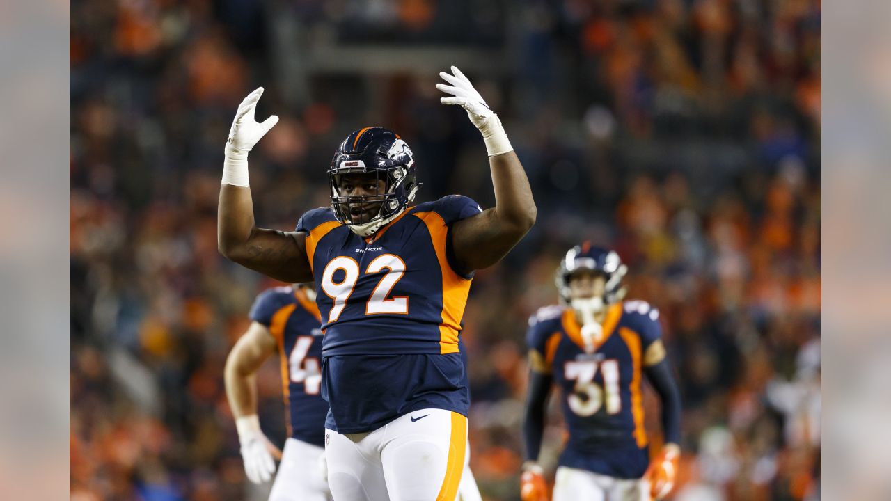 Denver Broncos defensive end Zach Kerr (92) celebrates during an NFL football game against the Cleveland Browns on Saturday, Dec. 15, 2018, in Denver. The Browns defeated the Broncos, 17-16. (Ryan Kang via AP)