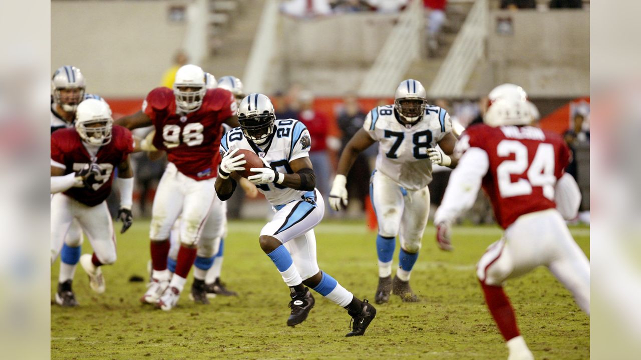 Carolina Panthers running back Mike Davis (28) is wrapped up by Arizona  Cardinals linebacker Isaiah Simmons (48) during an NFL football game,  Sunday, Oct. 4, 2020, in Charlotte, N.C. (AP Photo/Brian Westerholt