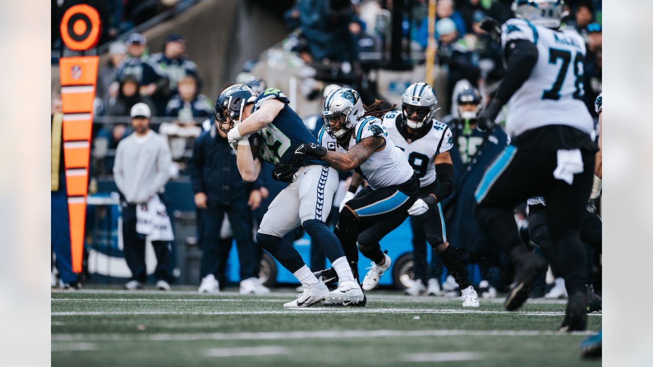 Carolina Panthers defensive tackle Daviyon Nixon (54) sings while sitting  on the bench during an NFL football game against the Denver Broncos,  Sunday, Nov. 27, 2022, in Charlotte, N.C. (AP Photo/Brian Westerholt