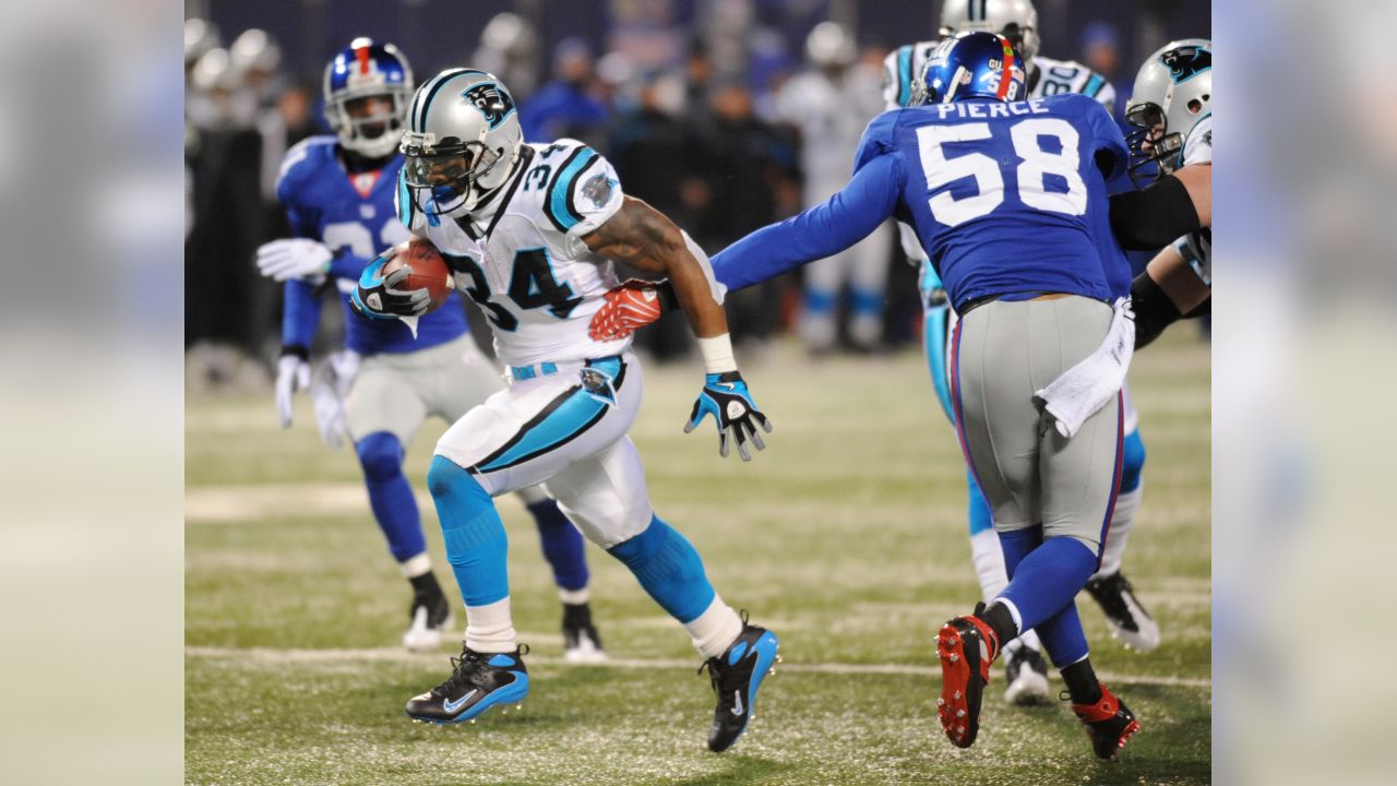 Carolina Panthers running back Camerun Peoples (32) warms up before an NFL  pre-season football game against the New York Giants on Friday, Aug. 18,  2023, in East Rutherford, N.J. (AP Photo/Rusty Jones