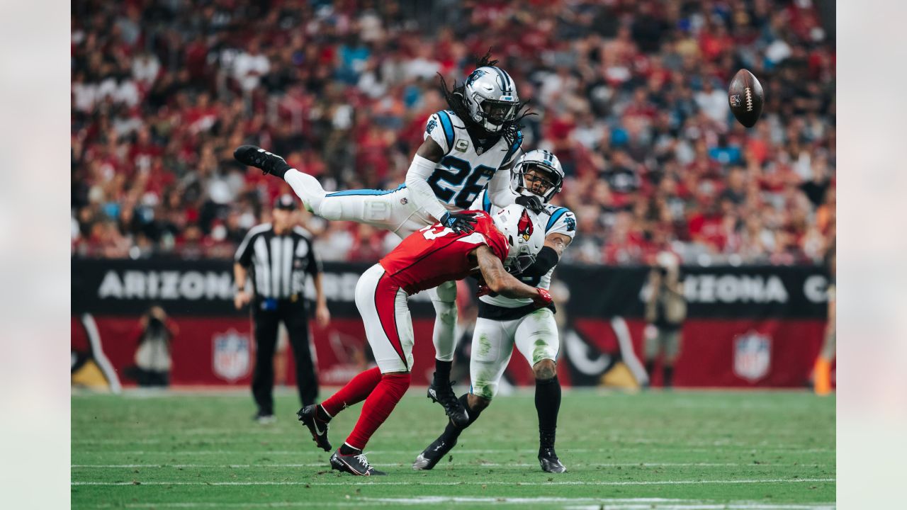 Arizona Cardinals running back Chris Johnson (R) picks up a first down in  the second quarter of the Cardinals-San Francisco 49ers game at University  of Phoenix Stadium in Glendale, Arizona, September 27