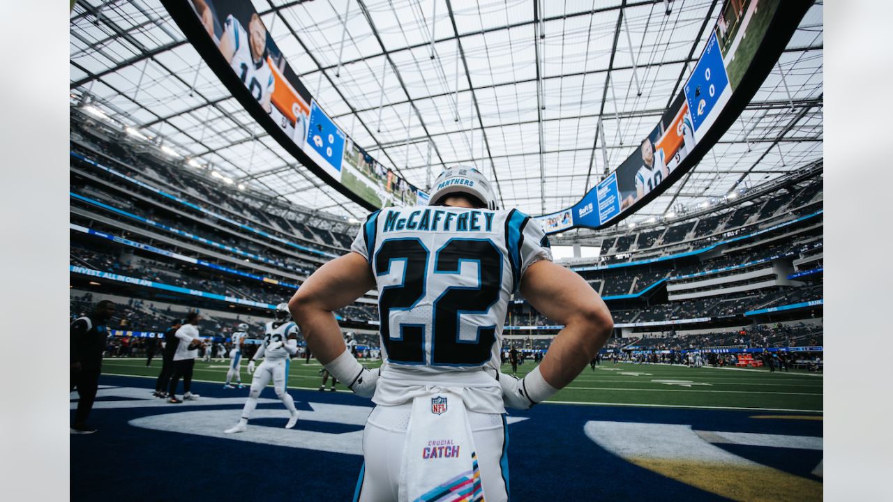 Carolina Panthers running back Christian McCaffrey (22) stands on the  sidelines as Carolina plays the Los Angeles Rams in the second half of an  NFL football game in Charlotte, North Carolina on