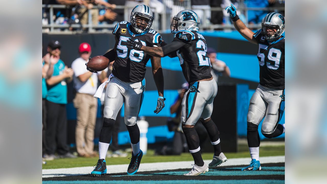 Carolina Panthers running back Mike Davis (28) is wrapped up by Arizona  Cardinals linebacker Isaiah Simmons (48) during an NFL football game,  Sunday, Oct. 4, 2020, in Charlotte, N.C. (AP Photo/Brian Westerholt