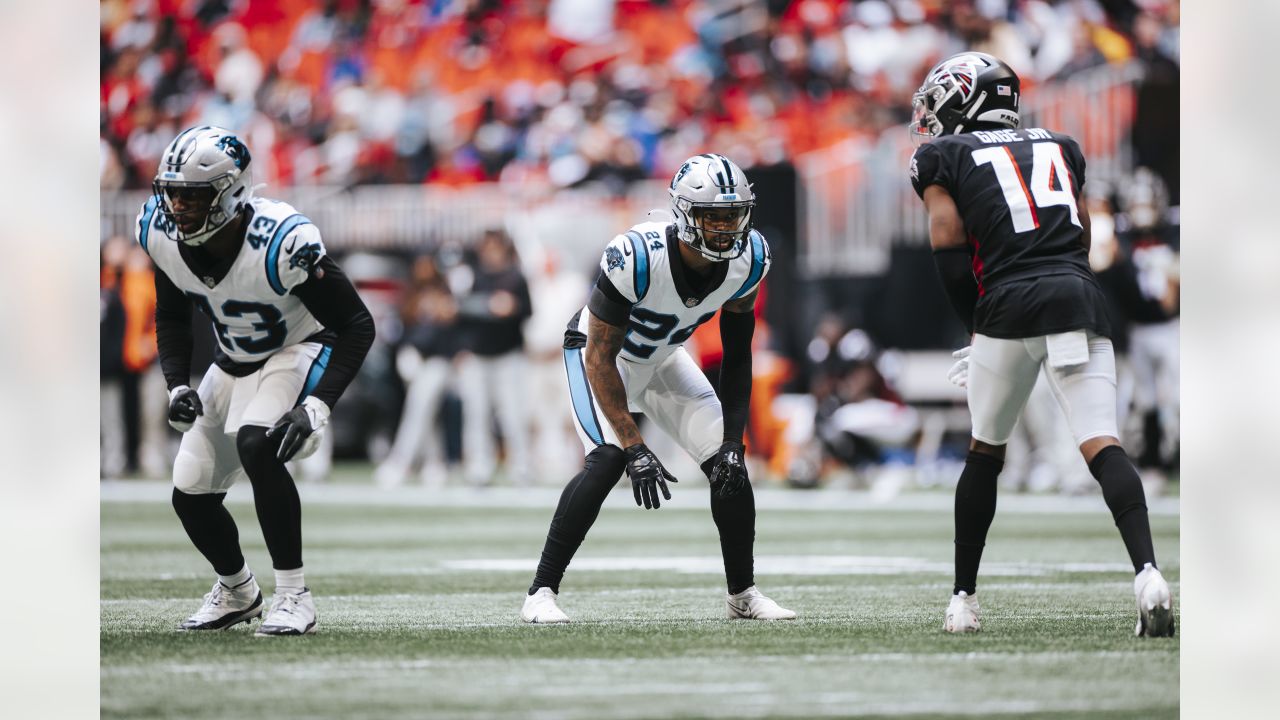 Carolina Panthers cornerback Stephon Gilmore (9) intercepts a pass intended  for Atlanta Falcons tight end Kyle Pitts (8) during the second half of an  NFL football game, Sunday, Oct. 31, 2021, in