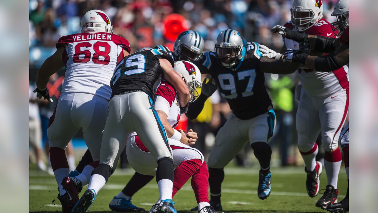 Carolina Panthers running back Mike Davis (28) is wrapped up by Arizona  Cardinals linebacker Isaiah Simmons (48) during an NFL football game,  Sunday, Oct. 4, 2020, in Charlotte, N.C. (AP Photo/Brian Westerholt