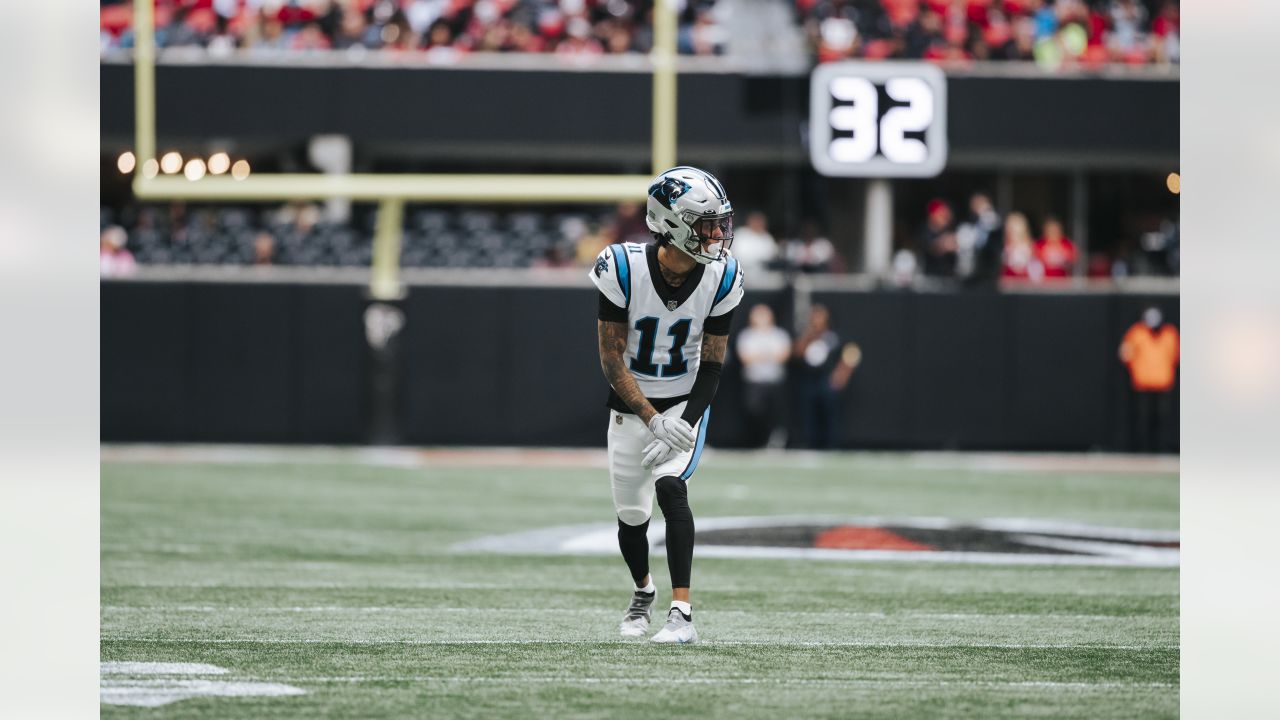 Carolina Panthers cornerback Stephon Gilmore (9) intercepts a pass intended  for Atlanta Falcons tight end Kyle Pitts (8) during the second half of an  NFL football game, Sunday, Oct. 31, 2021, in