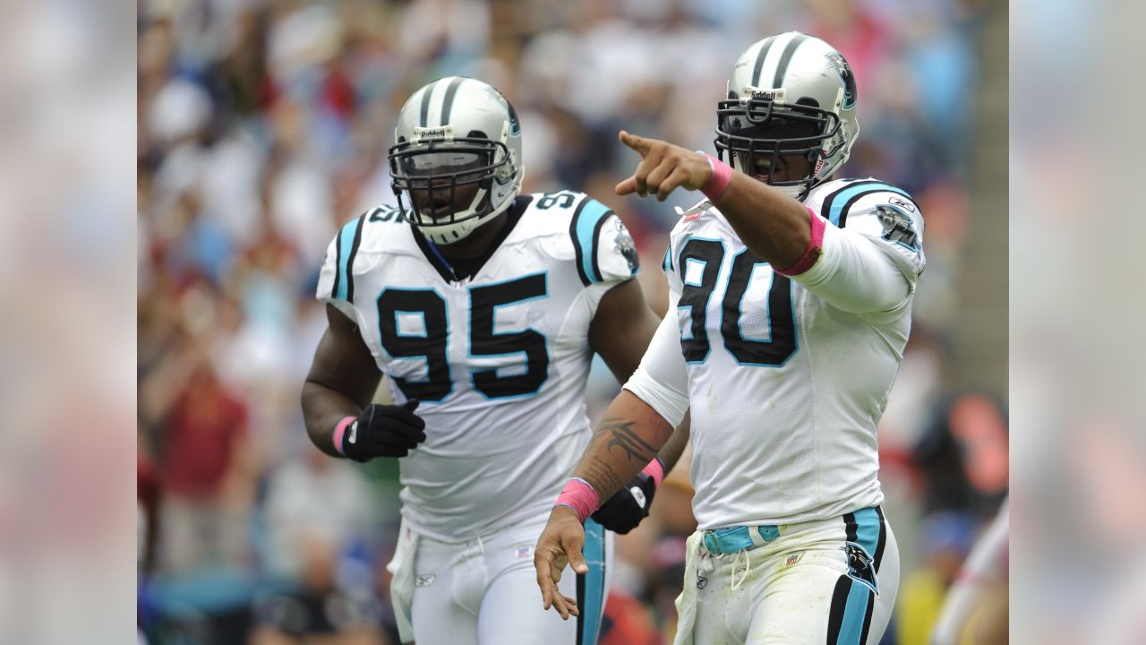 Carolina Panthers' Charles Johnson (95) glances over toward