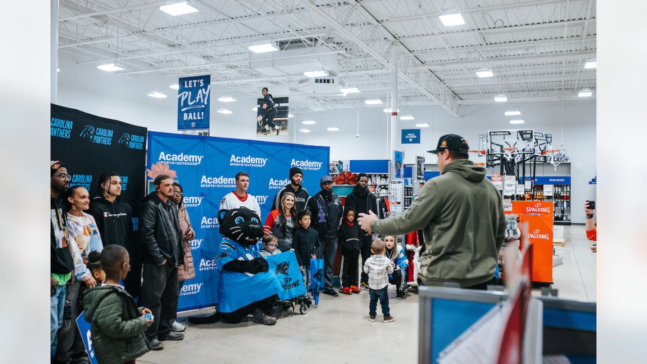 Austin Corbett, Panthers host holiday shopping spree at Academy