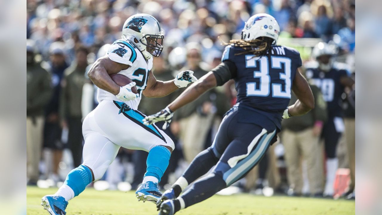 Carolina Panthers running back Jonathan Stewart, left, breaks free