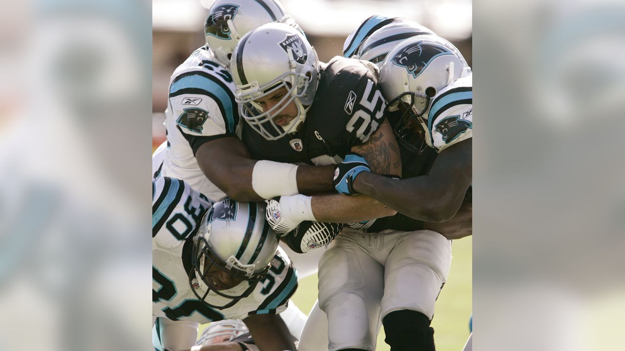 Carolina Panthers vs. Las Vegas Raiders. NFL Game. American Football League  match. Silhouette of professional player celebrate touch down. Screen in  background. Stock Photo