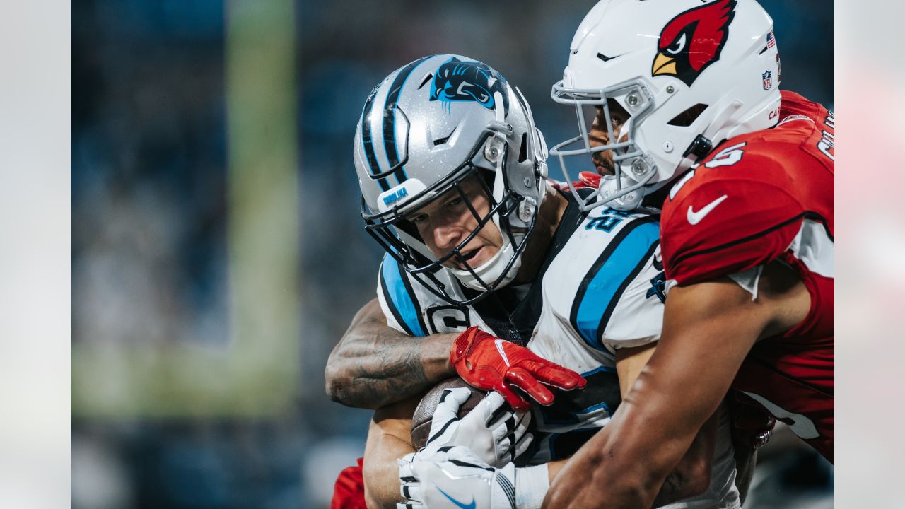 Carolina Panthers' Jeremy Chinn, left, tries unsuccessfully to