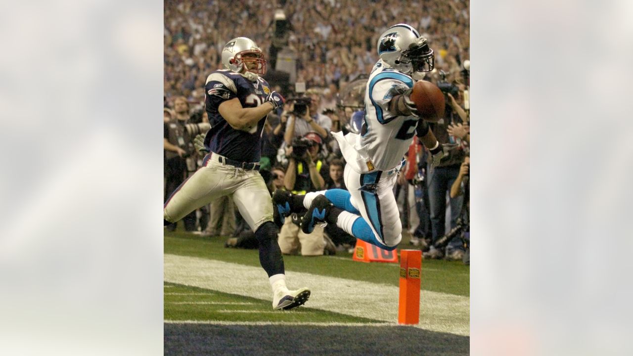 Carolina Panthers Steve Smith (89) celebrates his fourth quarter catch that  set up a touchdown run by teammate DeShaun Foster during Super Bowl XXXVIII  in Houston, Sunday Feb. 1, 2004. New England