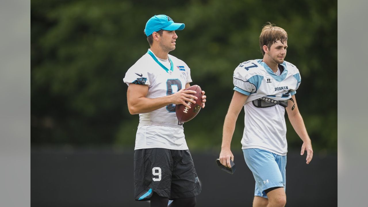 Carolina Panthers' Graham Gano (9) walks to the team's practice