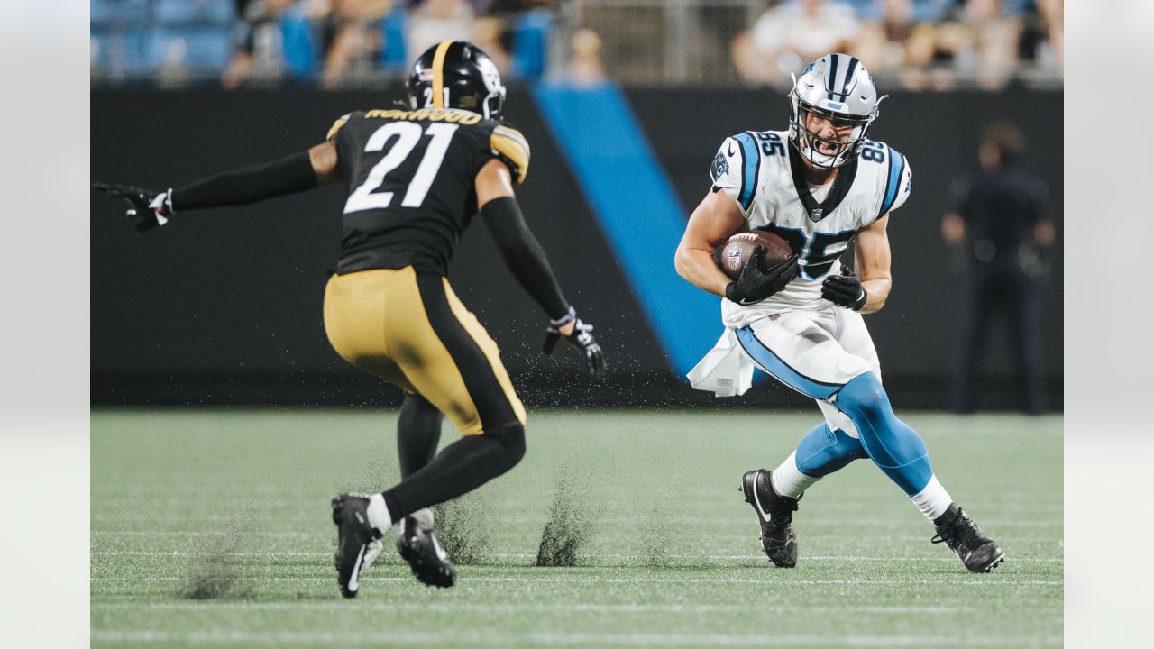 Carolina Panthers kicker Ryan Santoso wears a 9/11 FDNY hat during