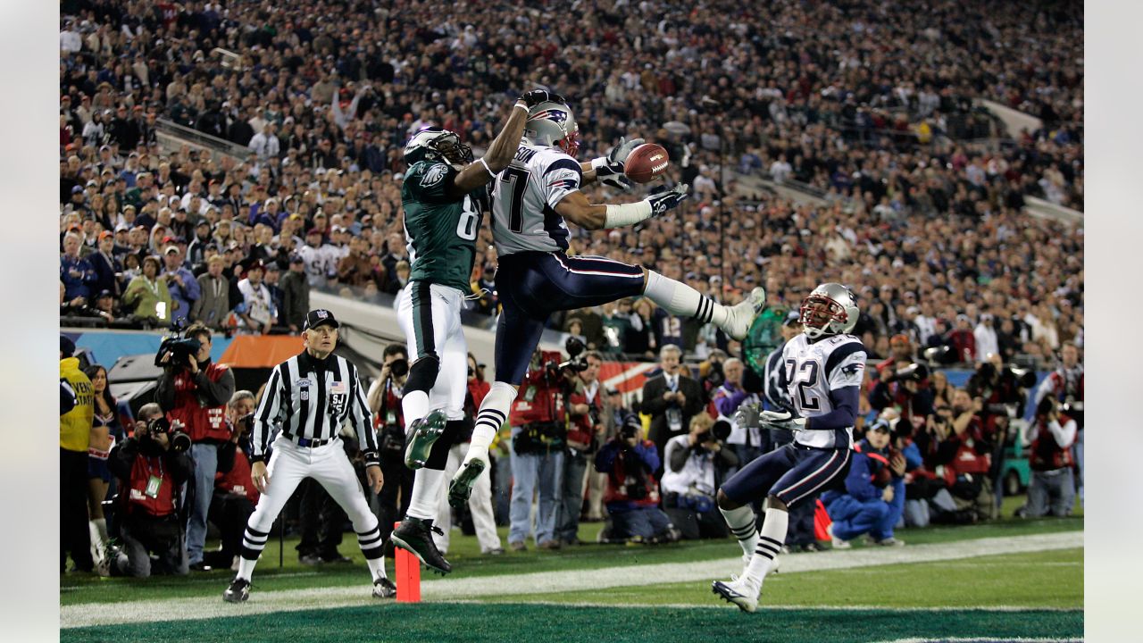 Asante Samuel of the New England Patriots intercepts Donovan