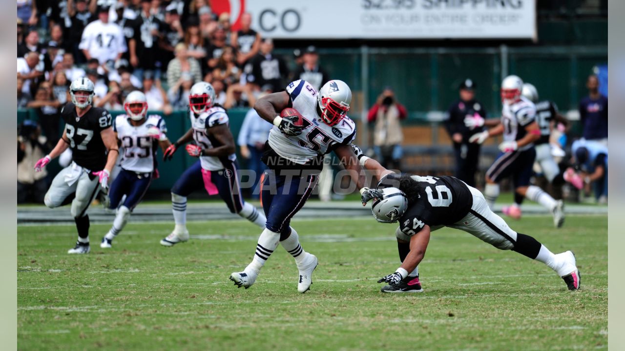 04 October 2009. Patriot Tackle Matt Light (72) and Offensive Line Coach  Dante Scarnecchia on the sidelines. The New England Patriots defeated the  Baltimore Ravens 27 to 21 in NFL Week 4