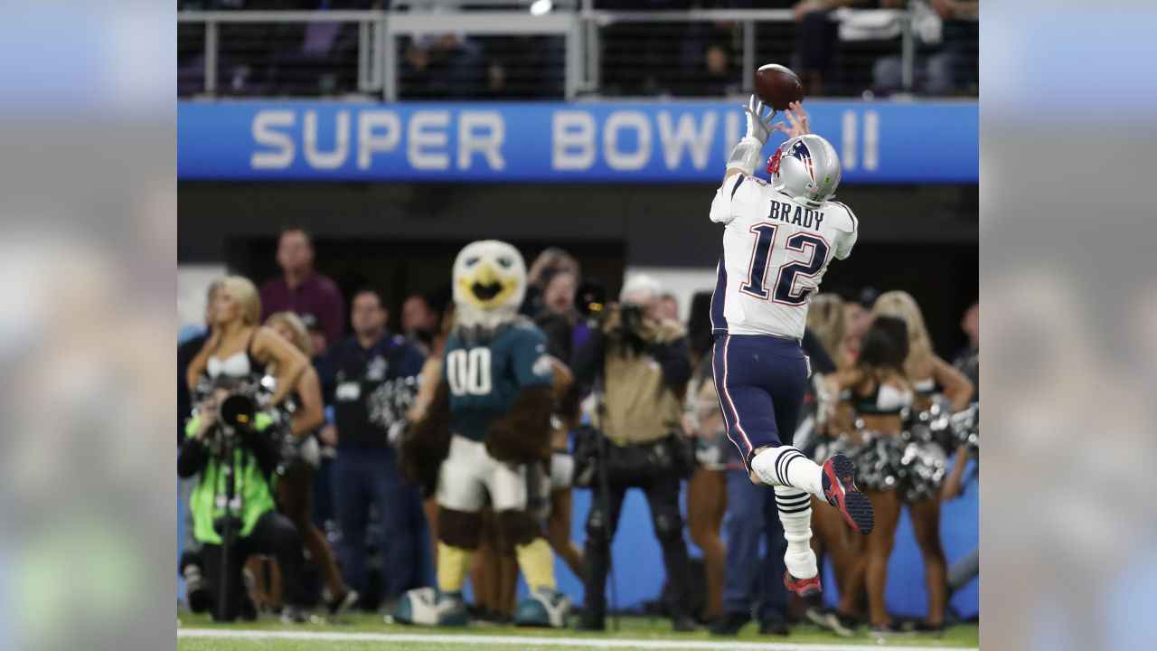 New England Patriots quarterback Tom Brady (12), runs on the field for  warmup before the NFL Super Bowl 52 football game against the Philadelphia  Eagles, Sunday, Feb. 4, 2018, in Minneapolis. (AP