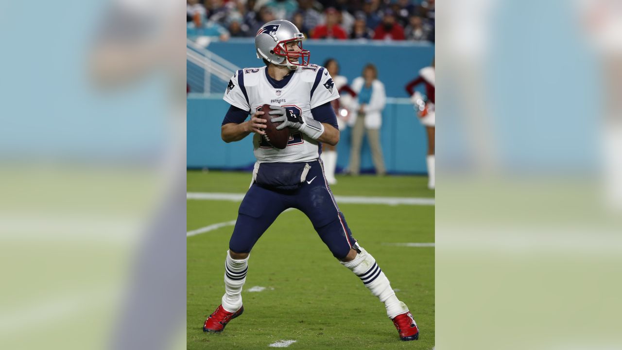 New England Patriots quarterback Tom Brady looks at the board during 2nd  half action, between the Miami Dolphins, and the New England Patriots  September 12, 2011 at Sun Life Stadium in Miami