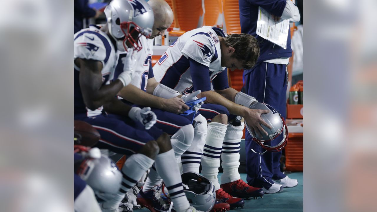 New England Patriots quarterback Tom Brady looks at the board during 2nd  half action, between the Miami Dolphins, and the New England Patriots  September 12, 2011 at Sun Life Stadium in Miami