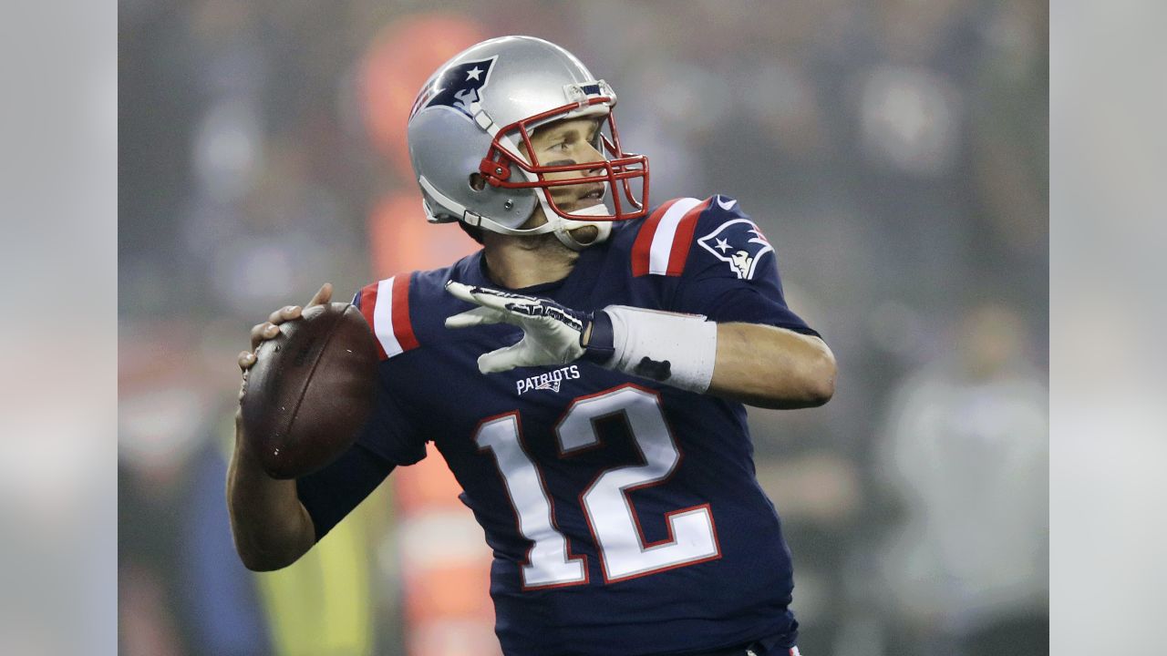 New England Patriots quarterback Tom Brady (12) quarterback Jimmy Garoppolo  (10) while warming up before the game against the Atlanta Falcons at  Gillette Stadium in Foxborough, Massachusetts on October 22, 2017. Photo