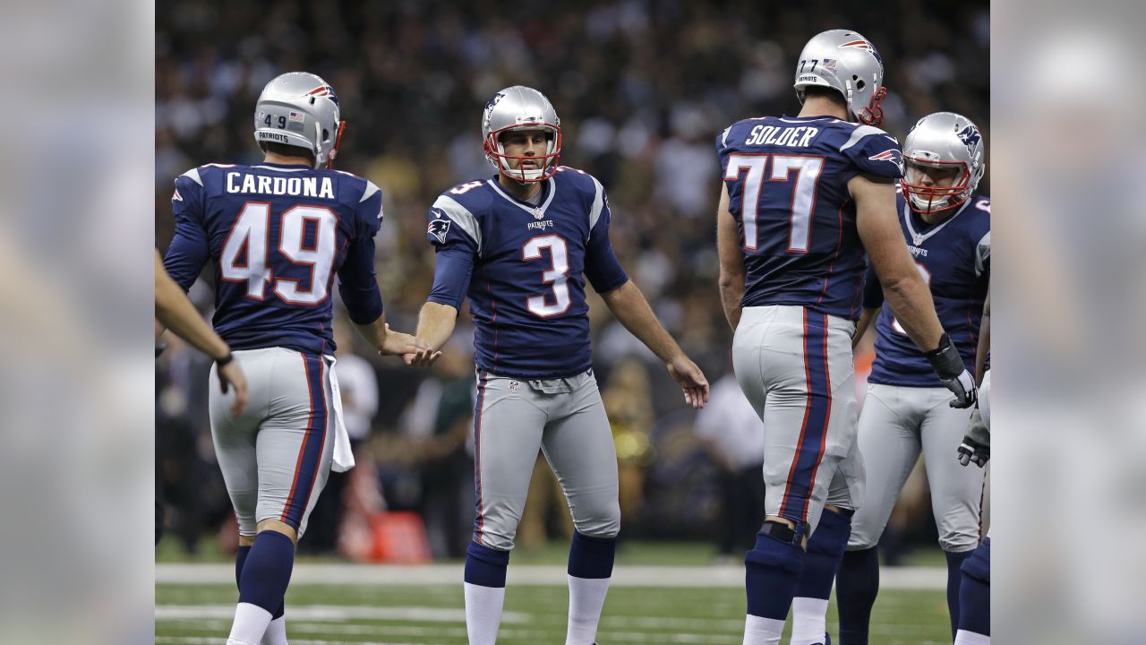 AP source: Patriots re-sign long snapper Cardona for 4 years