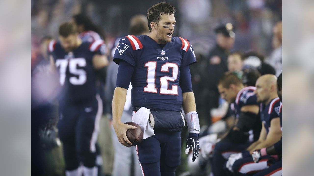 New England Patriots quarterback Tom Brady (12) quarterback Jimmy Garoppolo  (10) while warming up before the game against the Atlanta Falcons at  Gillette Stadium in Foxborough, Massachusetts on October 22, 2017. Photo