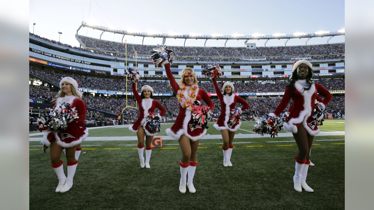 New England Patriots cheerleaders dressed in costumes wait for the start of  the game against the New York Jets at Gillette Stadium in Foxboro,  Massachusetts on October 21, 2012. The Patriots defeated