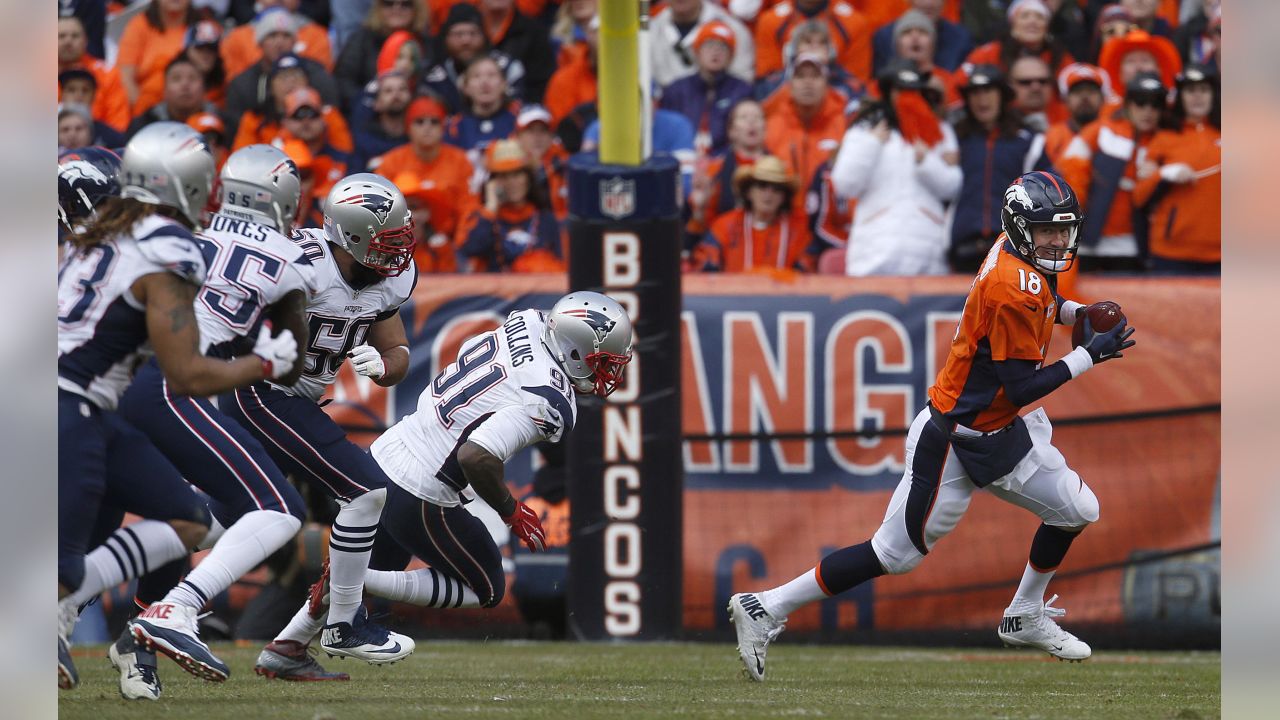 Denver Broncos Peyton Manning throws against the New England Patriots  during the AFC Championship game at Sport Authority Field at Mile High in  Denver on January 24, 2016. Denver advances to Super