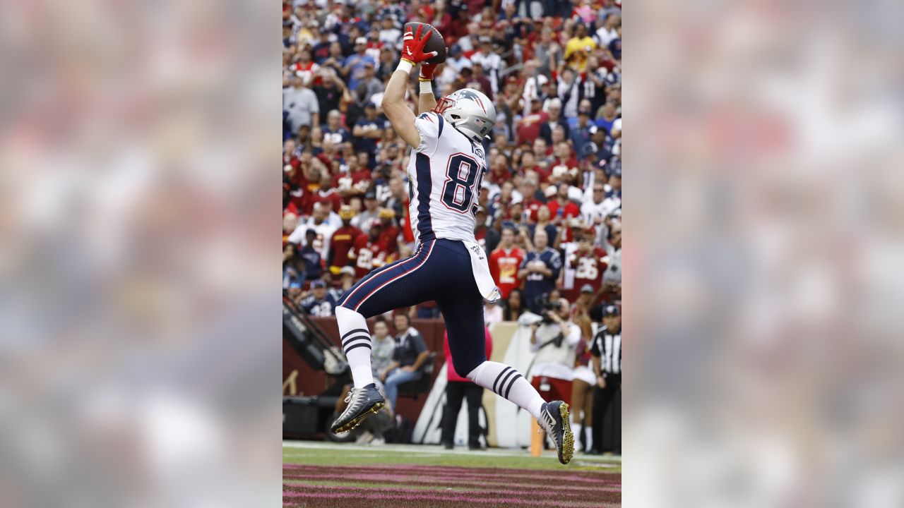 New England Patriots fullback Jakob Johnson (47)- is tripped up by  Washington Redskins strong safety Landon Collins (20) during the first half  of an NFL football game, Sunday, Oct. 6, 2019, in