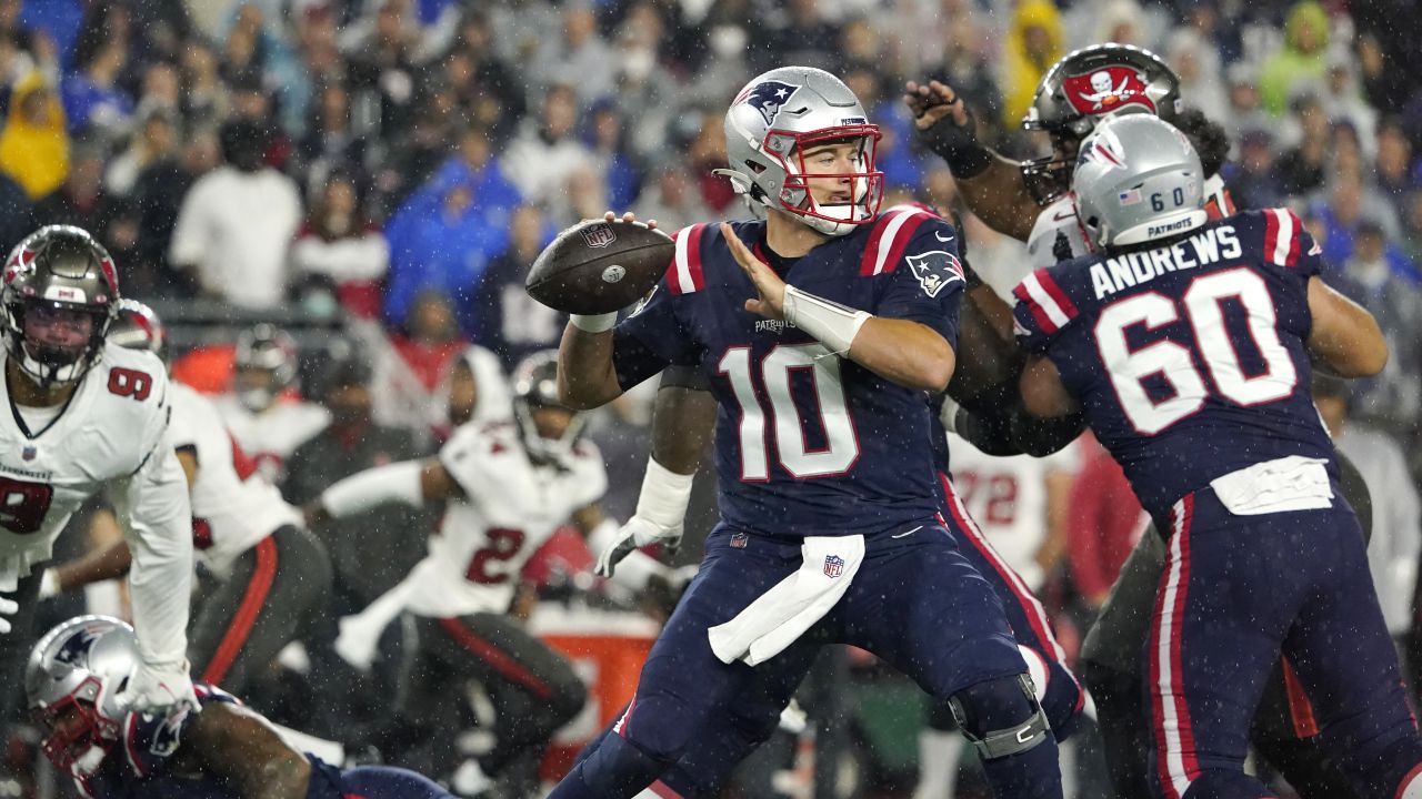 Tampa Bay Buccaneers quarterback Tom Brady (12) puts on his helmet during  the second half of an NFL football game against the New England Patriots,  Sunday, Oct. 3, 2021, in Foxborough, Mass. (